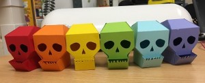 rainbow paper cut skull containers