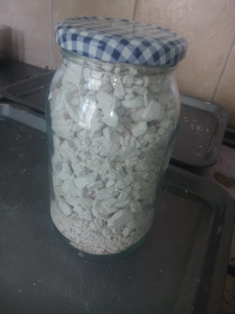 Plaster granules cooling in jar